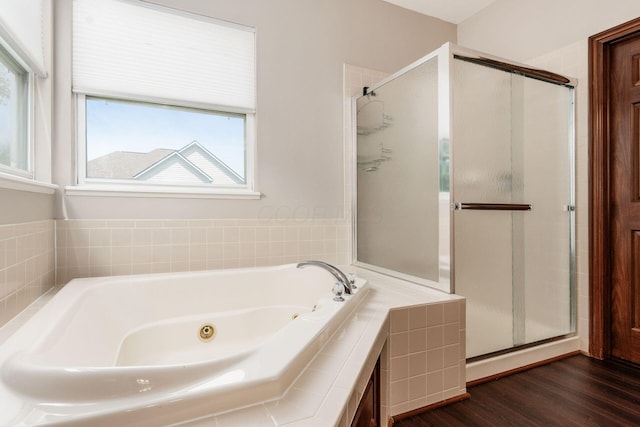 6923 Bishops Crossing Cir, Dublin, OH 43016 - bathroom with a shower stall, a tub with jets, and wood finished floors
