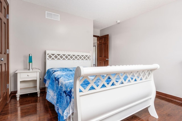 6923 Bishops Crossing Cir, Dublin, OH 43016 - bedroom featuring wood finished floors and baseboards