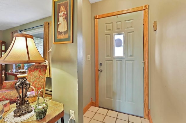 12232 Cleo Rd, Orient, OH 43146 - entryway with light tile patterned floors and baseboard heating