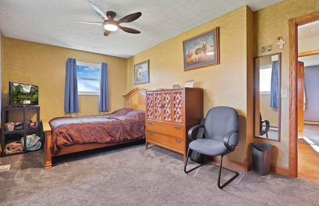 12232 Cleo Rd, Orient, OH 43146 - carpeted bedroom featuring multiple windows, a textured ceiling, and a ceiling fan