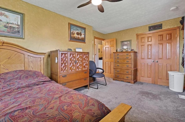 12232 Cleo Rd, Orient, OH 43146 - bedroom with carpet flooring, a textured ceiling, ceiling fan, and a textured wall