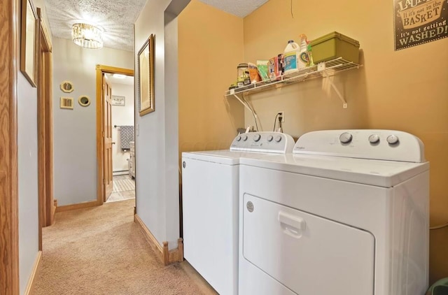 12232 Cleo Rd, Orient, OH 43146 - laundry area with light carpet, washing machine and dryer, and a textured ceiling