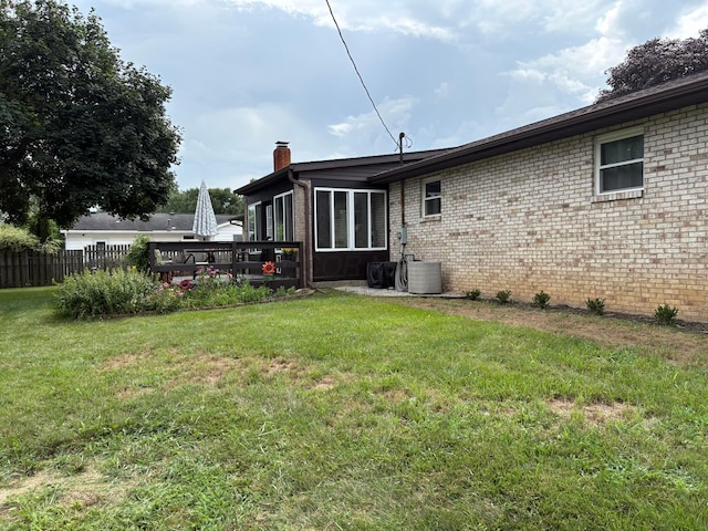 12232 Cleo Rd, Orient, OH 43146 - back of house with a chimney, brick siding, and a wooden deck