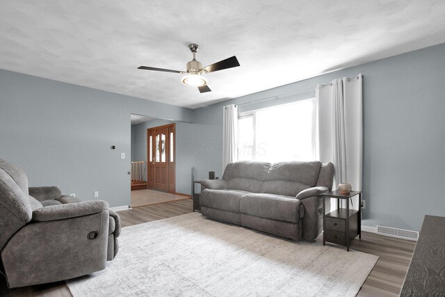 6146 Catawba Dr, Grove City, OH 43123 - living area featuring wood finished floors and a ceiling fan