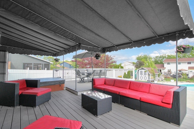 6146 Catawba Dr, Grove City, OH 43123 - wooden terrace featuring a hot tub, a storage shed, an outdoor hangout area, outdoor dining area, and a residential view