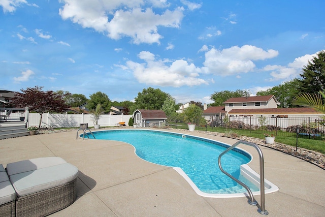 6146 Catawba Dr, Grove City, OH 43123 - view of pool with a patio area, a fenced backyard, and a storage unit