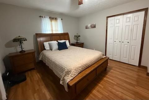 521 Kenton Galion Rd E, Marion, OH 43302 - bedroom with wood finished floors, a closet, and ceiling fan