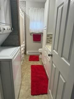 521 Kenton Galion Rd E, Marion, OH 43302 - laundry room with stacked washer and clothes dryer