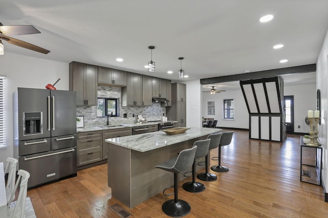 10123 Loop Rd, Millersport, OH 43046 - kitchen with high end fridge, a ceiling fan, plenty of natural light, tasteful backsplash, and recessed lighting