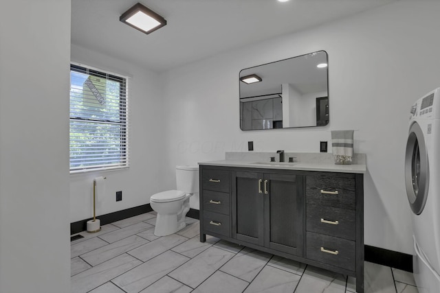 10123 Loop Rd, Millersport, OH 43046 - bathroom featuring washer / clothes dryer and vanity