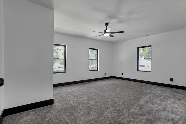 10123 Loop Rd, Millersport, OH 43046 - carpeted spare room featuring ceiling fan and baseboards