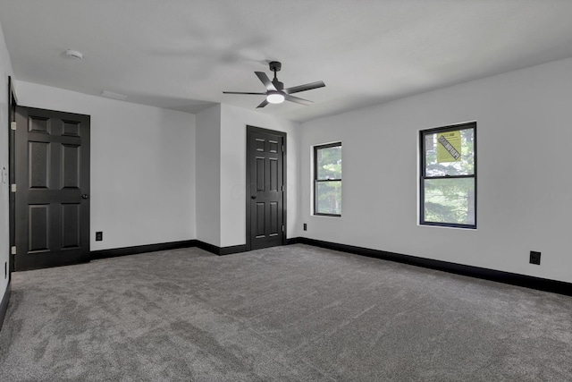 10123 Loop Rd, Millersport, OH 43046 - unfurnished bedroom with carpet flooring and a ceiling fan