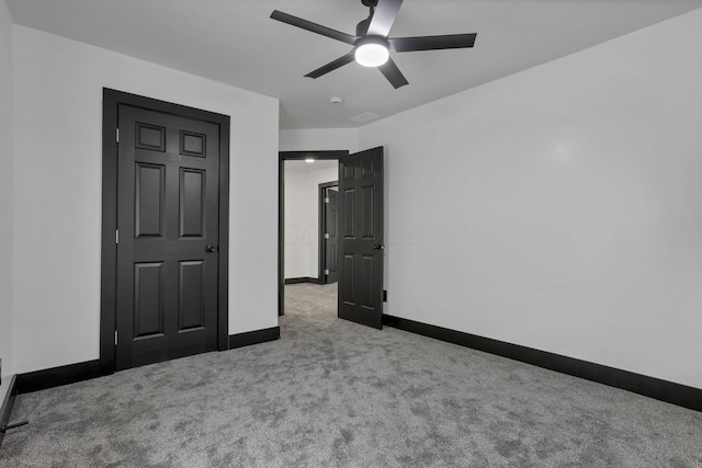 10123 Loop Rd, Millersport, OH 43046 - unfurnished bedroom with carpet flooring and ceiling fan