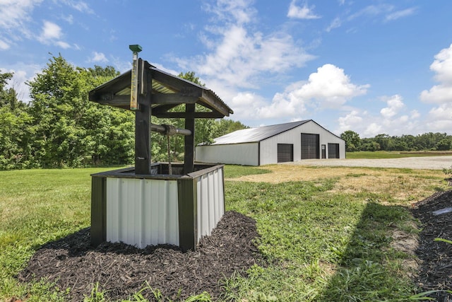 10123 Loop Rd, Millersport, OH 43046 - view of green lawn featuring a garage, a pole building, and an outdoor structure