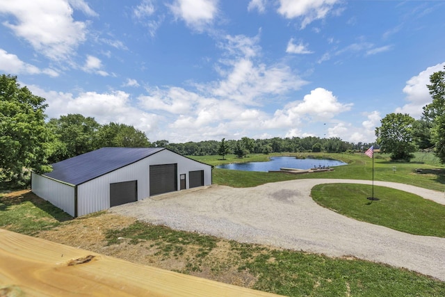 10123 Loop Rd, Millersport, OH 43046 - view of pole building with a water view, a lawn, and view of wooded area