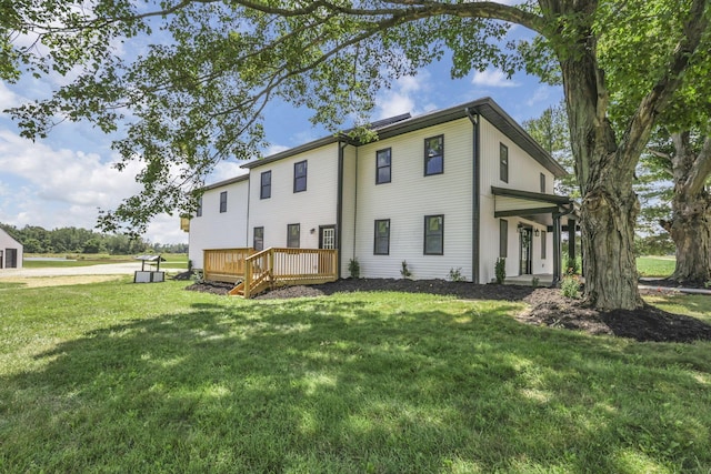 10123 Loop Rd, Millersport, OH 43046 - rear view of property with a lawn and a deck