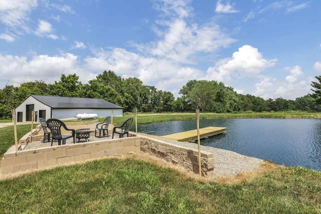 10123 Loop Rd, Millersport, OH 43046 - dock with a fire pit, a water view, and a lawn