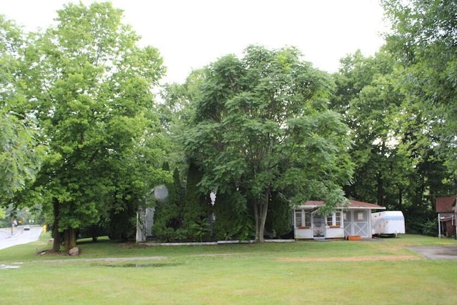 128 Gilead St, Cardington, OH 43315 - view of grassy yard with an outbuilding