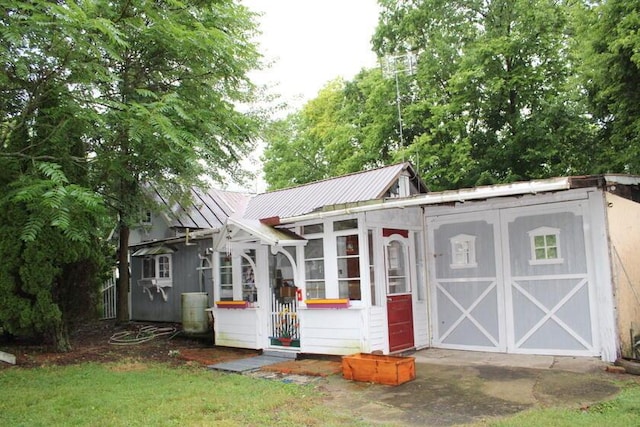 128 Gilead St, Cardington, OH 43315 - view of outdoor structure with a sunroom