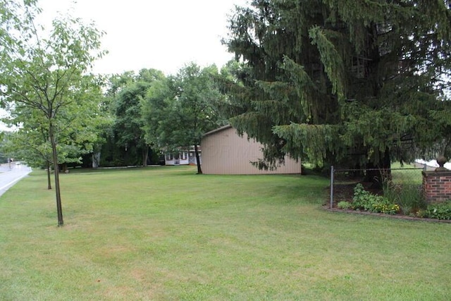 128 Gilead St, Cardington, OH 43315 - view of green lawn with view of wooded area