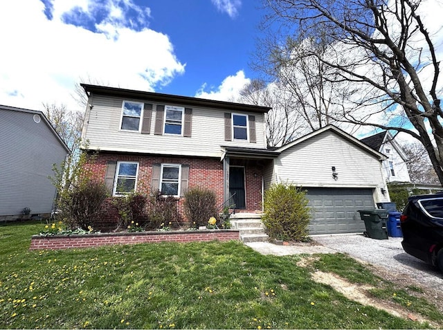 1944 Dyer Rd, Grove City, OH 43123 - colonial-style house with a garage, brick siding, a front lawn, and gravel driveway