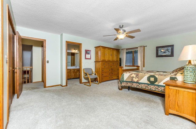 976 Hillside Dr, Newark, OH 43055 - bedroom featuring light colored carpet, a textured ceiling, a ceiling fan, and ensuite bathroom
