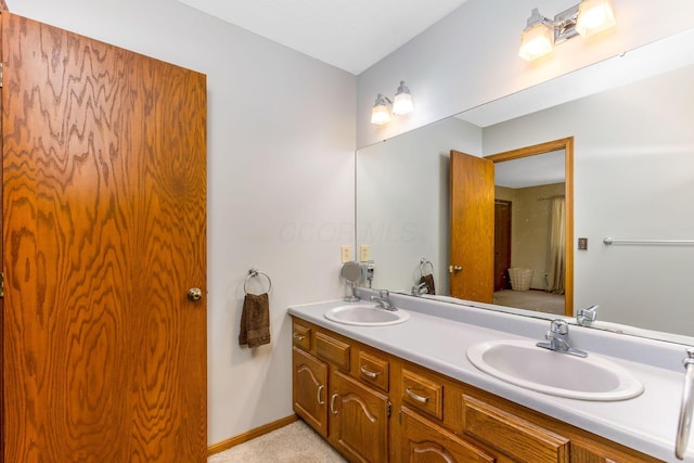 976 Hillside Dr, Newark, OH 43055 - full bathroom featuring double vanity and baseboards