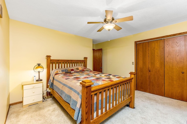 976 Hillside Dr, Newark, OH 43055 - bedroom with light carpet, a closet, and a ceiling fan