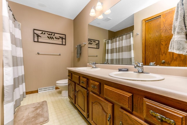 976 Hillside Dr, Newark, OH 43055 - bathroom with tile patterned floors, double vanity, and a shower with shower curtain