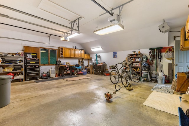 976 Hillside Dr, Newark, OH 43055 - garage featuring a workshop area and a garage door opener
