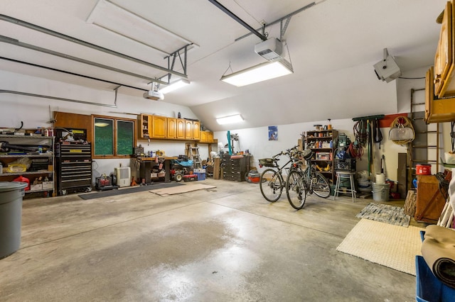 976 Hillside Dr, Newark, OH 43055 - garage featuring a workshop area and a garage door opener