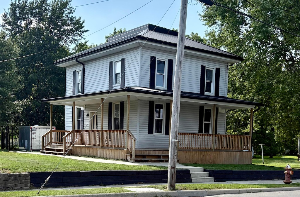 279 Whetstone St, Bucyrus, OH 44820 - view of front facade with covered porch and a front yard