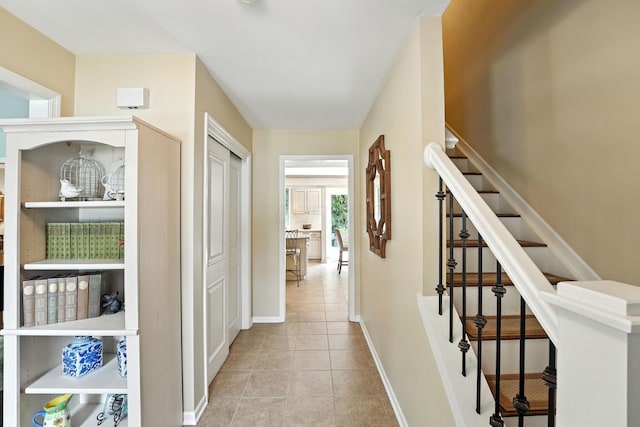 371 Ashworth Ct, Dublin, OH 43017 - hall with tile patterned floors and stairway