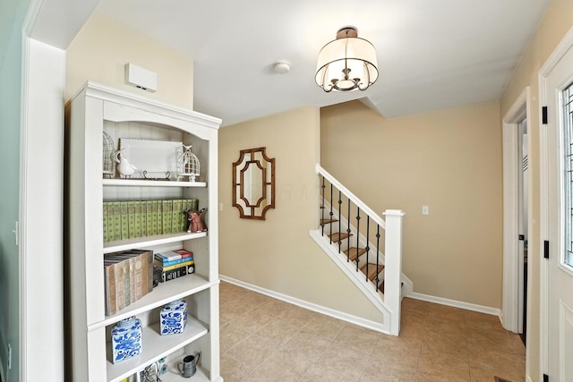 371 Ashworth Ct, Dublin, OH 43017 - interior space featuring stairs, a chandelier, and tile patterned flooring