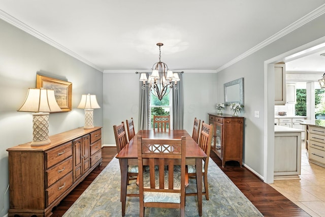 371 Ashworth Ct, Dublin, OH 43017 - dining space with a chandelier, wood finished floors, and ornamental molding