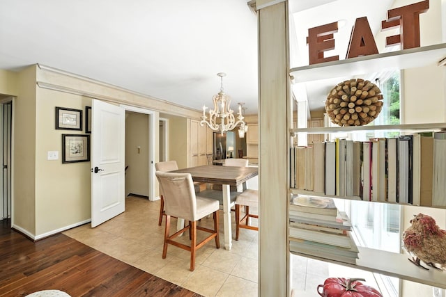 371 Ashworth Ct, Dublin, OH 43017 - dining room featuring a chandelier and hardwood / wood-style floors