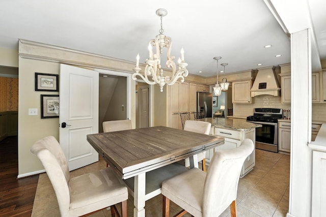 371 Ashworth Ct, Dublin, OH 43017 - dining area with a chandelier, recessed lighting, and ornamental molding