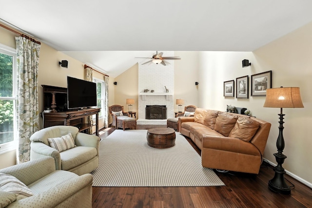 371 Ashworth Ct, Dublin, OH 43017 - living area with dark wood finished floors, a fireplace, ceiling fan, and lofted ceiling