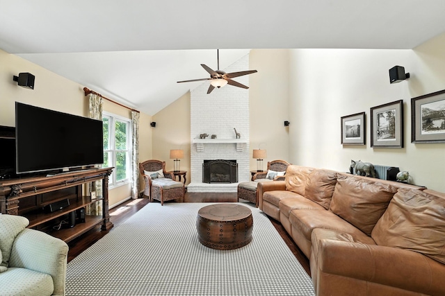 371 Ashworth Ct, Dublin, OH 43017 - living area featuring wood finished floors, ceiling fan, a fireplace, and vaulted ceiling