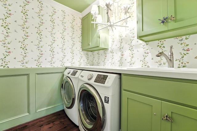 371 Ashworth Ct, Dublin, OH 43017 - laundry room featuring cabinet space, wallpapered walls, washer and clothes dryer, dark wood-type flooring, and a wainscoted wall