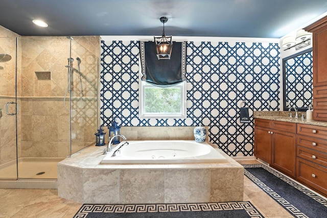 371 Ashworth Ct, Dublin, OH 43017 - bathroom with a whirlpool tub, a stall shower, and tile patterned flooring