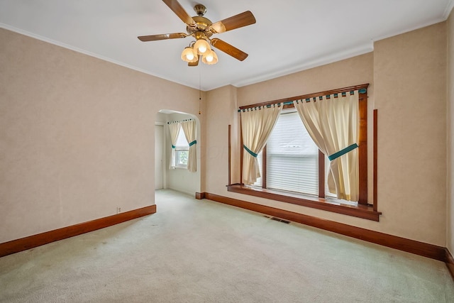 126 Dix Ave, Marion, OH 43302 - carpeted spare room with ornamental molding, ceiling fan, and arched walkways