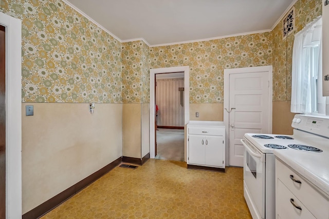 126 Dix Ave, Marion, OH 43302 - kitchen with white range with electric cooktop, wallpapered walls, light floors, wainscoting, and white cabinetry