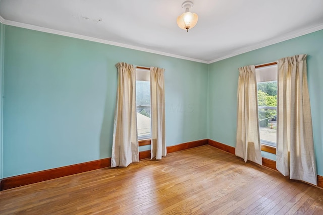 126 Dix Ave, Marion, OH 43302 - spare room featuring hardwood / wood-style floors and ornamental molding
