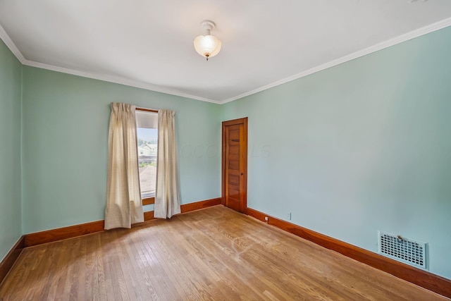 126 Dix Ave, Marion, OH 43302 - unfurnished room with light wood finished floors and ornamental molding