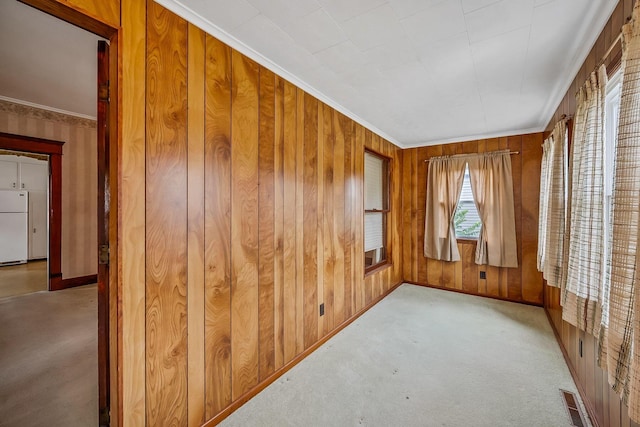 126 Dix Ave, Marion, OH 43302 - carpeted empty room with wood walls and crown molding