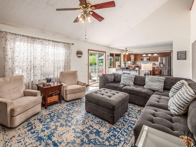 238 Key Blvd, Pataskala, OH 43062 - living area with a ceiling fan, a textured ceiling, and high vaulted ceiling