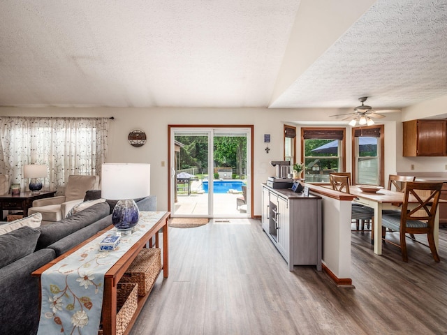 238 Key Blvd, Pataskala, OH 43062 - living area with a textured ceiling, wood finished floors, and a ceiling fan