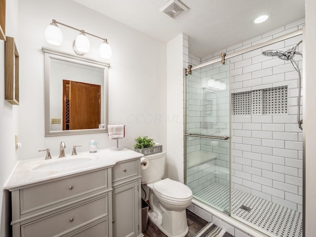 238 Key Blvd, Pataskala, OH 43062 - full bathroom featuring a shower stall, vanity, a textured ceiling, and recessed lighting
