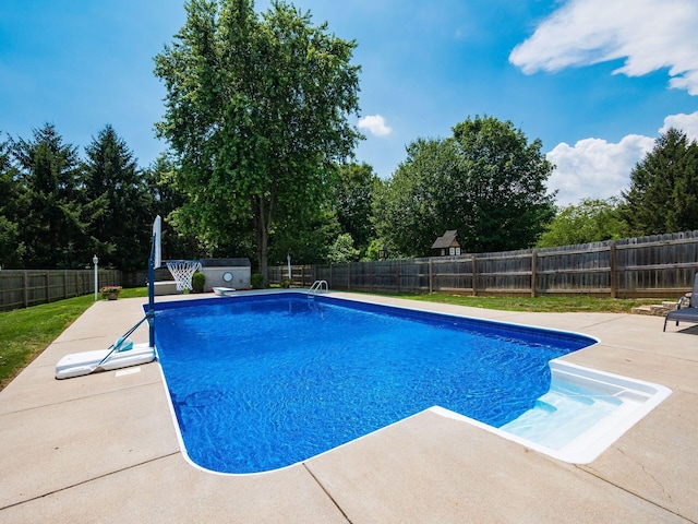 238 Key Blvd, Pataskala, OH 43062 - view of swimming pool featuring a patio, a diving board, and a fenced backyard